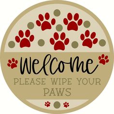 a sign that says welcome please wipe your paws with red and black paw prints on it