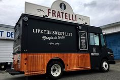 a food truck parked in front of a building with the word fratelli on it's side