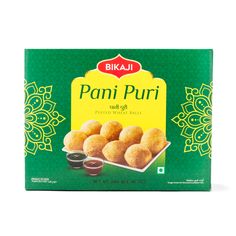 a box of pani puri with dipping sauces