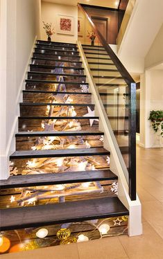 the stairs are decorated with christmas lights and stars on them, as well as decorations