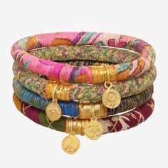 Upcycled sari fabrics and make a statement in these beautiful, blissful bangles. Named after the Sanskrit word "Nirvanam" for bliss. Charm Bangles, Blues And Greens, Sari Fabric, Charm Bangle, Bangles, Charms, Fabric