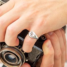 A personalised solid silver initial ring is a timeless essential piece of jewellery that holds sentimental value. This unique custom-engraved solid silver signet ring is perfect for a milestone birthday, such as an 18th or 21st birthday gift for a son or grandson. I deeply custom engrave overlapping monogram initials, with the option for an additional inside engraved message on the back of the ring face. The silver ring is solid throughout; the back is not hollow and is hallmarked in the UK for Symbolic Signet Ring With Initials, Symbolic Personalized Initial Ring In White Gold, Personalized Symbolic White Gold Initial Ring, Sterling Silver Engraved Ring With Initials, Sterling Silver Symbolic Engraved Ring With Initials, Symbolic Sterling Silver Engraved Ring With Initials, Classic Engraved Signet Ring For Father's Day, Personalized Sterling Silver Signet Ring, Engraved Signet Ring For Father's Day