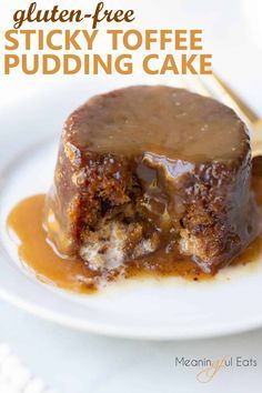 a piece of sticky toffe pudding on a white plate