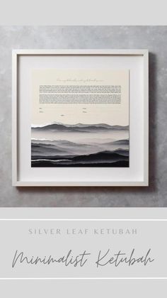 the silver leaf ketubah print hanging on a wall