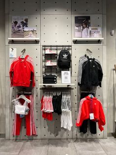 a display in a store filled with lots of clothing