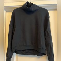 Mock Neck. Cropped Fit In Front. Never Been Worn. New With Tags. Soft A&F Collection Casual Comfortable Turtleneck With Funnel Neck, Sporty Tops With Funnel Neck And Ribbed Cuffs, Sporty Funnel Neck Top With Ribbed Cuffs, Sporty Top With Funnel Neck And Ribbed Cuffs, Funnel Neck Athleisure Tops For Streetwear, Black Sporty Top With Funnel Neck, Black Sporty Funnel Neck Tops, Athleisure Funnel Neck Top For Streetwear, Sporty Black Top With Funnel Neck