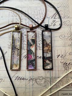 These lovely pendants are made with Washi tape decoupaged onto an elegant rectangular drop cabochon. Comes on a coordinated 22" waxed cotton cord. Drop Pendant, Cotton Cord, Waxed Cotton, Crafts To Sell, Washi Tape, Washi, Pendant Necklaces, Style Vintage, Jewelry Necklace Pendant