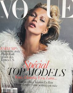 a magazine cover with a woman in white fur coat on it's front page