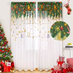 a christmas tree in front of a window with curtains and presents on the floor next to it