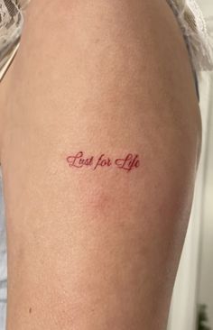 a woman with a tattoo saying best for life