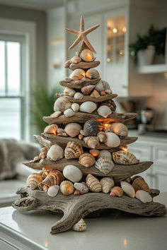 a christmas tree made out of seashells on a kitchen counter