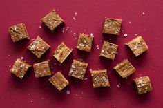 pieces of brownie sitting on top of a red surface