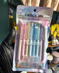 a package of pastey colored pens sitting on top of a table