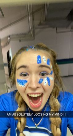 School Cheer Makeup, Face Paint Team Spirit, Face Paint For Fnl, Blue School Spirit Outfits, Homecoming Game Face Paint, Blue Out Game Outfit, Blue Out Day Spirit Week, Blue Out Spirit Day