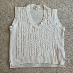 Never Worn/Brand New V Neck, Sleeveless Perfect For Layering Or Styled By Itself! Fitted Cream Sweater Vest Casual, Casual White Cotton Sweater Vest, Cozy Sleeveless Cotton Tops, Cream Cotton Sleeveless Sweater Vest, Casual Knitted Cream Sweater Vest, Casual Cream Knitted Sweater Vest, Casual Cream Knit Tank Top, Trendy White Knit Vest, White Cotton Tank Top For Fall