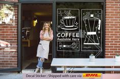 a woman standing in front of a coffee shop