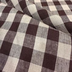 brown and white checkered fabric is shown