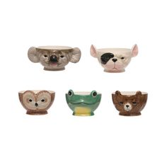 four ceramic bowls with animals on them in different shapes and sizes, including one for the head