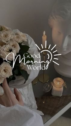 a woman holding a bouquet of white roses in front of a mirror with the words good morning world on it