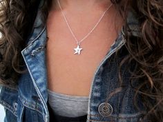 "This tiny adorable star has a heart in the center. For the star-gazers and the dreamers. Only 1/2\" square and made from sterling silver it is reversible, wear either side. Choose your chain style and length from the drop down menu. For the smaller version: https://www.etsy.com/listing/225888118/sterling-silver-star-on-a-string For the matching earrings: https://www.etsy.com/listing/225890145/little-star-earrings-sterling-silver Mother-Daughter Set: https://www.etsy.com/listing/225891123/sterli Everyday Personalized Star-shaped Jewelry, Star-shaped Charm Necklaces For Gifts, Sterling Silver Starfish Charm Necklace, Everyday Star Charm Jewelry, Nickel-free Sterling Silver Star Charm Necklace, Sterling Silver Star Charm Necklace Nickel Free, Personalized Sterling Silver Star Charm Necklace, Silver Star Charm Necklace, Tiny Star-shaped Sterling Silver Jewelry