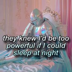 a robot sitting on top of a bed next to a pink and blue wall with the words, they knew i'd be too powerful if i could sleep at night