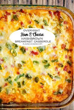 a casserole dish with cheese and vegetables in it on a baking sheet, next to the words overnight jam & cheese hashbrown breakfast casserole