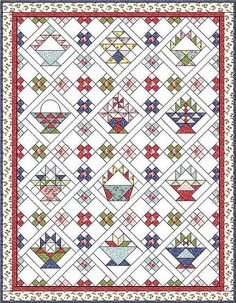 a white quilt with red, blue and green designs on the border is featured in this image