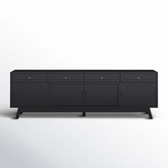 the sideboard is black and has four drawers on one end, and two doors on the