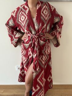 Yak Wool robe.  This robe is perfect for winter, Chill in your unique loungewear around the house Or wear it out like a dress on the streets.  You could dress it with thermal leggings and a muffler top.  Length approx 52 inches Chest size 56 inches.  One size: Fits upto size 2XL Dry clean recommend Oversized Bohemian Wrap Robe, Red Bohemian Robe With Kimono Sleeves, Unique Loungewear, Wool Robe, Bohemian Long Sleeve Patchwork Robe, Long Sleeve Red Cotton Robe, Mens Robes, Red Bohemian One-size Kimono, Winter Robes