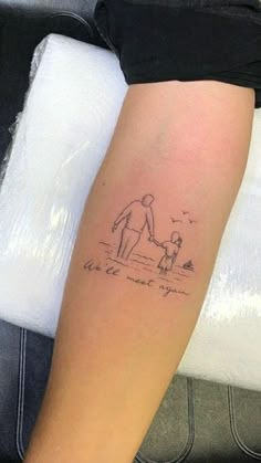 a person with a tattoo on their arm