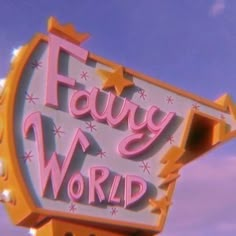 the famous sign for fairy world is pink and yellow with stars on it's side