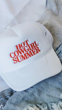 Hot Cowgirl Summer! Saddle up for the hottest season yet with the Hot Cowgirl Summer hat! So go ahead, channel your inner cowgirl and ride into the summer with confidence and flair. Yeehaw! White hat Summer Trucker Snapback Hat, Casual Snapback Hat For Summer Country Events, Summer Trucker Baseball Cap With Curved Brim, White Western Hat For Spring, Trucker Baseball Cap With Curved Brim For Summer, Western White Trucker Hat With Curved Brim, Western Style White Trucker Hat With Curved Brim, Country Style White Baseball Cap, Summer Snapback Trucker Hat