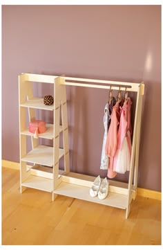 (paid link) DIY Clothes rack bedroom. Childroom Ideas, Clothing Rack Wood, Nursery Montessori, Wood Clothes Rack, Wood Clothing Rack, Wood Clothing, Kids Clothing Rack, Montessori Nursery