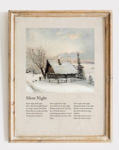 an old framed painting of a snowy night with a cabin in the background and snow on the ground