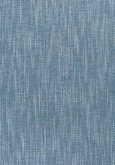 a blue and white fabric textured with small herringbones on an isolated background