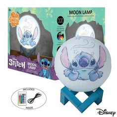 the light up ball has an image of stitch on it and is in front of a box