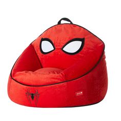 a red bean bag chair with spiderman eyes