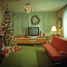 a living room decorated for christmas with presents on the floor and a television in the corner