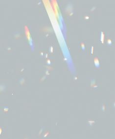 an abstract image of soap bubbles floating in the air with rainbow colors on top and bottom