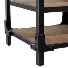 a wooden shelf with metal brackets on it