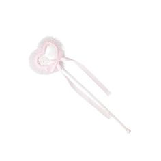 a white and pink heart shaped lollipop on a stick with a ribbon around it