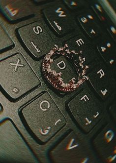 an old computer keyboard with the letter d on it