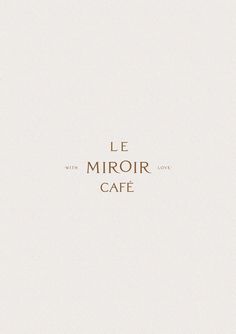 the cover of le miroir cafe, with gold foil lettering on it's white background