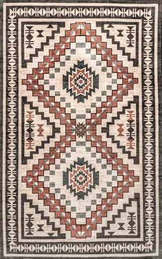 an old navajo rug with red, black and white designs on it's sides