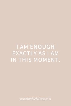 the words i am enough exactly as i am in this moment on a beige background