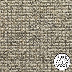 a close up view of the texture of a carpet with white and grey colors on it