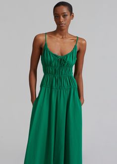 Color: Green Lightweight woven fabric Midi length A-line silhouette Scoop neckline Thin straps with self-tie at front Small keyhole detailing Ruched elasticated bodice Side seam hip pockets Asymmetrical hem Slip-on style Unlined 68% Rayon 32% Polyamide Hand Wash Cold or Professional Delicate Dry Clean By Proenza Schouler White Label. Imported Green Ruched Dress, White Label, Ruched Dress, Asymmetrical Hem, Proenza Schouler, Asymmetric Hem, Scoop Neckline, Summer Style, Green Dress