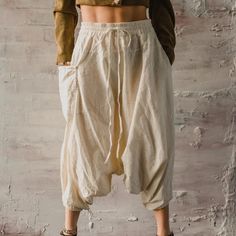 Buddha Pants Womens Elastic Waist Drawcord Boho Hippie O.G Harem Pants Beige Features: 100% Organic Cotton Elastic Waist Drawcord Tapered Leg Pockets Pull-On Style Tags: #Cargo, #Bohemian, #Boho, #Boho Chic, #Hippie, #Bohofashion, #Bohostyle, #Harem, #Lounge, #Pants, #Comfy Buddha Pants, Pants Comfy, Pants Womens, Lounge Pants, Boho Hippie, Beige Color, Cream White, Hippie Boho, Harem Pants