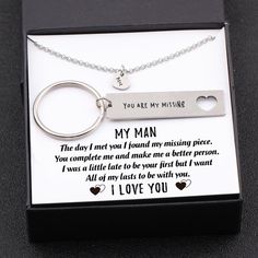 a silver necklace that says, you are missing my truck driver