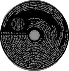 the back side of a black and white disc with words written in different languages on it